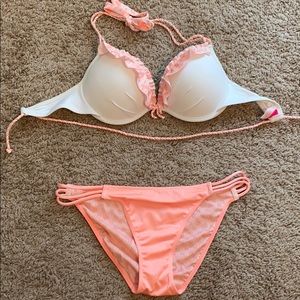 Victoria’s Secret pink and white bathing suit.